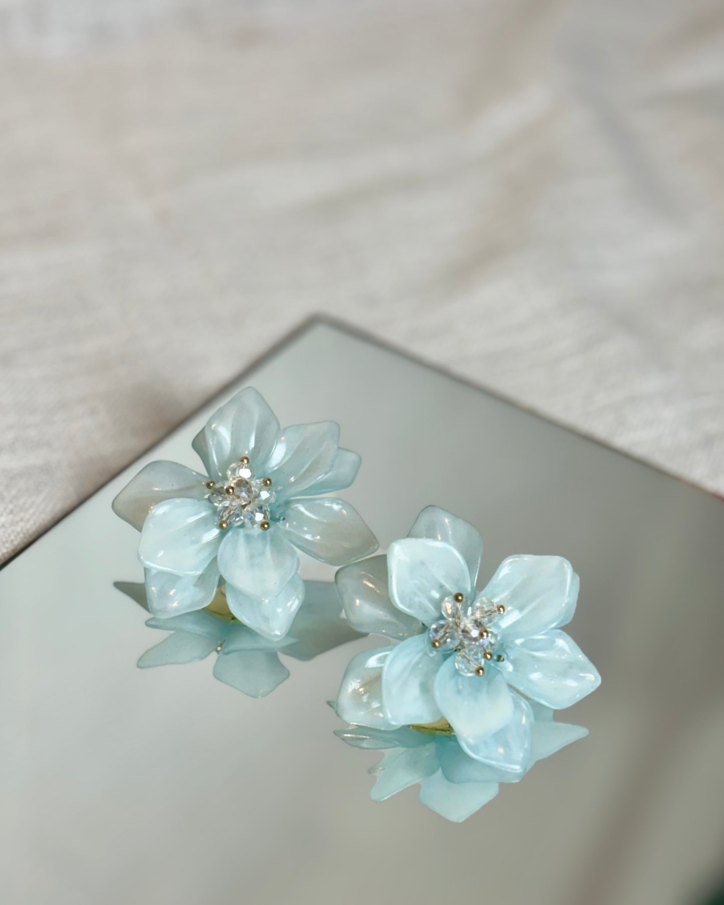 Caravanas de Flor Celestes